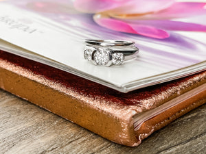 bezel set diamond engagement ring and white gold wedding band set